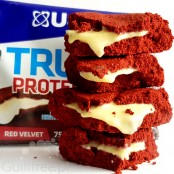 USN Trust Protein Cookie Red Velvet Cake - czekoladowe ciastko proteinowe z kremem biała czekolada